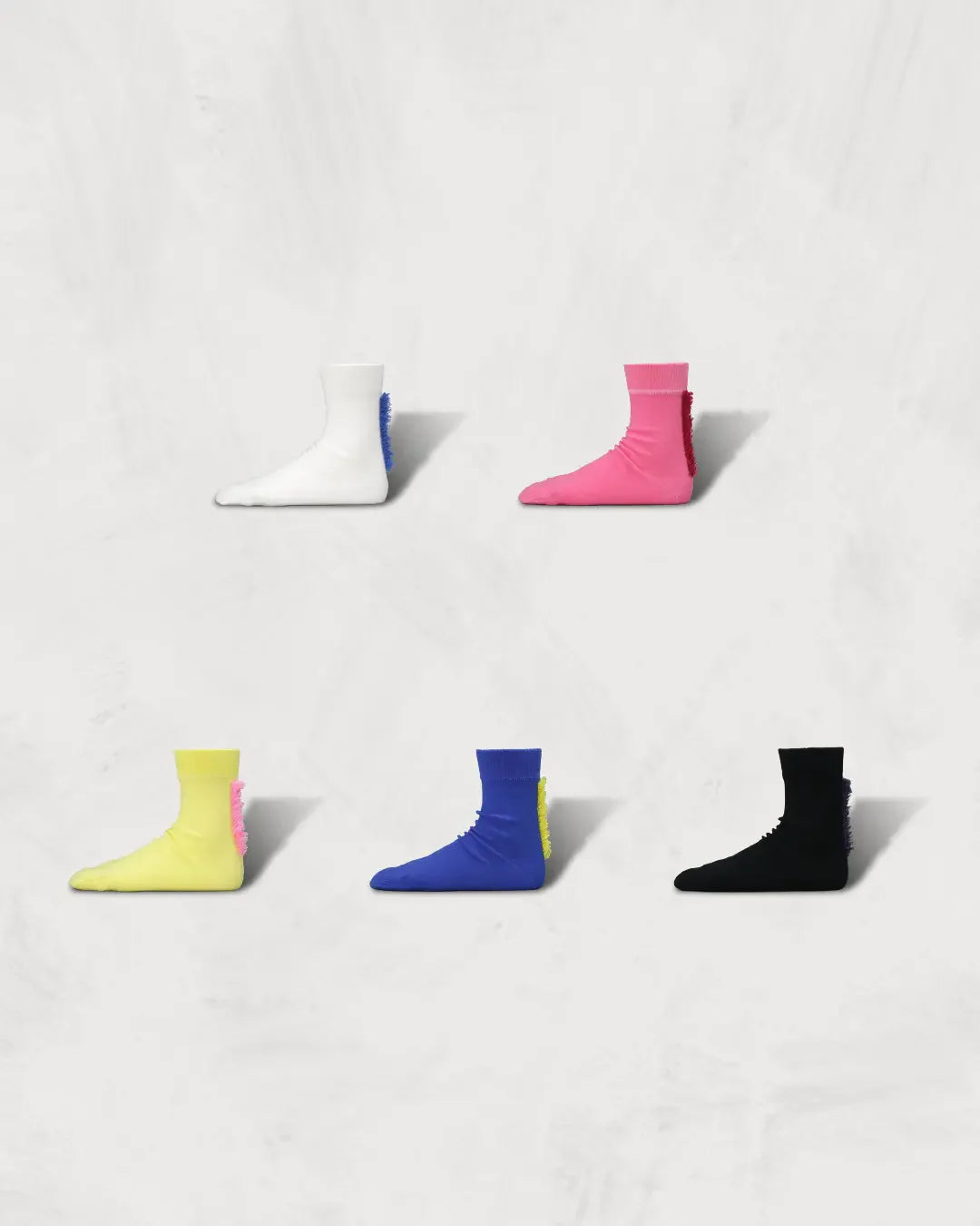 Regnsncox | Split-Toe Socks with Mohawk-Inspired Back Leg Design